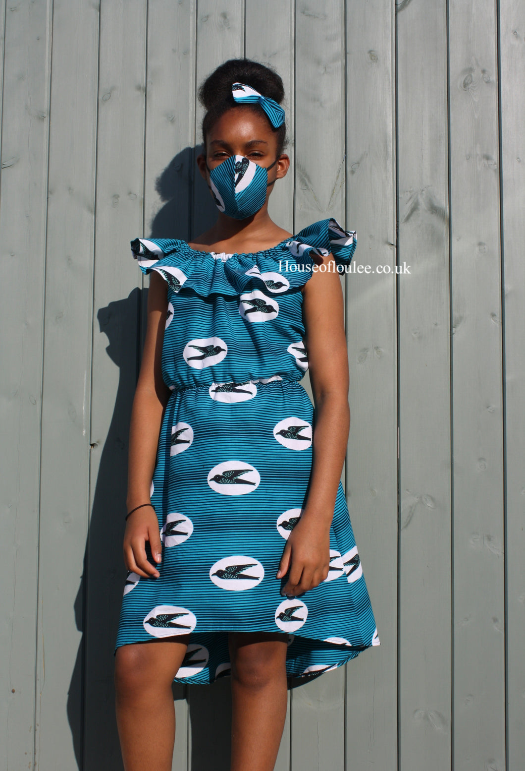 African print Bardot dress, white, turquoise, black lines, sparrows, matching face mask, matching hair bow   