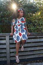 Load image into Gallery viewer, Children&#39;s African print Bardot dress in navy red and white, matching hair bow
